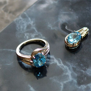 silver ring and pendant set with blue stone size 7